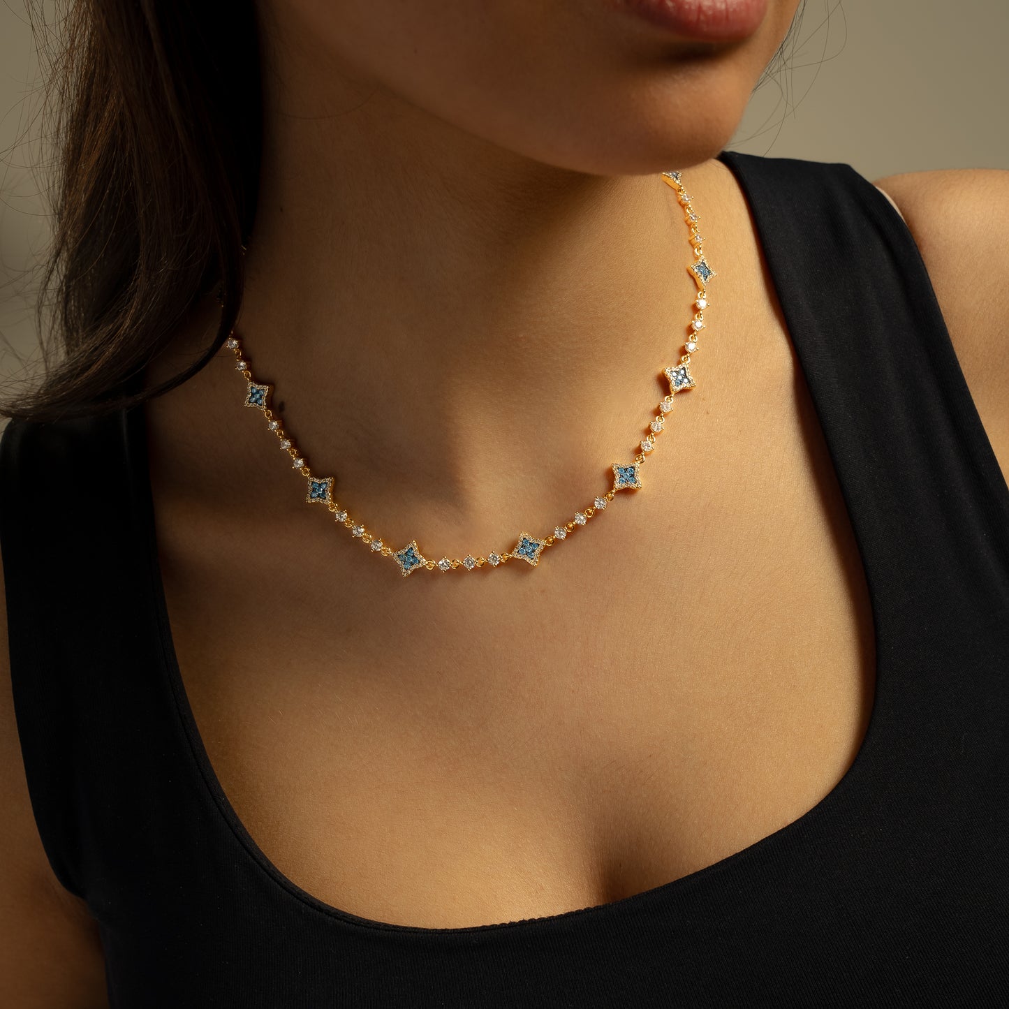 Gold Flower Tennis Chain - Blue Stones